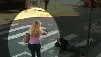 Off-duty police officer, mom hailed as hero for taking out would-be robber at Mother's Day event near school