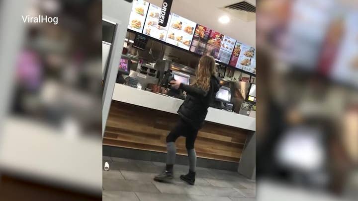 Irate KFC customer throws credit card machines at staff