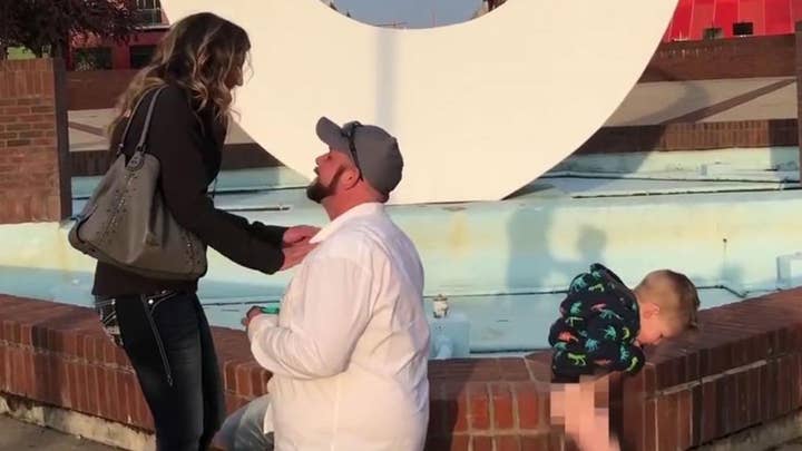 Little boy upstages his mom’s marriage proposal by peeing