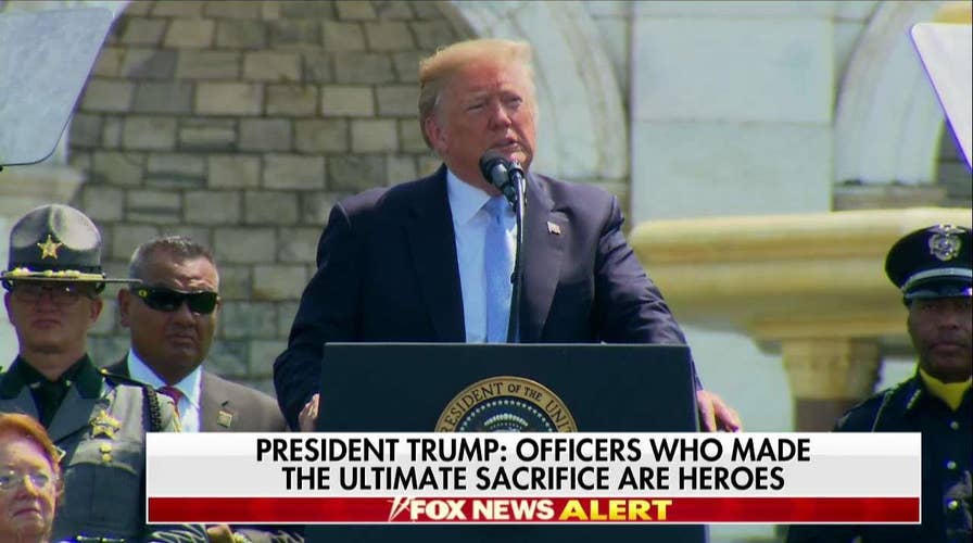 Trump tells stories of fallen police officers.