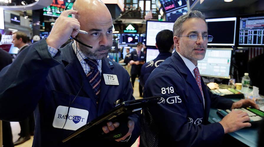 Stocks drop as interest rates spike
