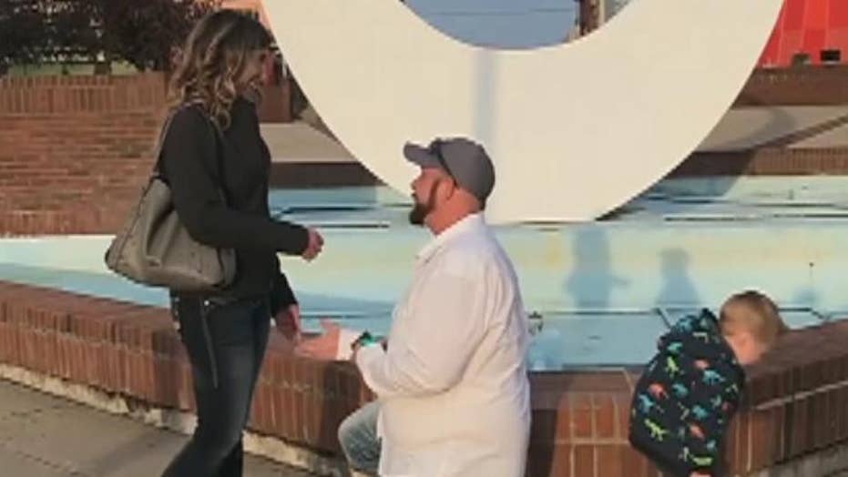 Peeing boy interrupts couple's proposal
