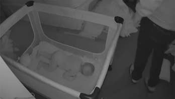 Nanny cam catches creepy intruder exposing himself as baby, mom slept