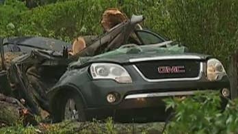 At least 2 dead, hundreds of thousands without power after violent storms slam Northeast