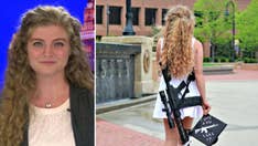 Conservative graduate who posed with gun in viral photo fires 'big scary rifle' in video