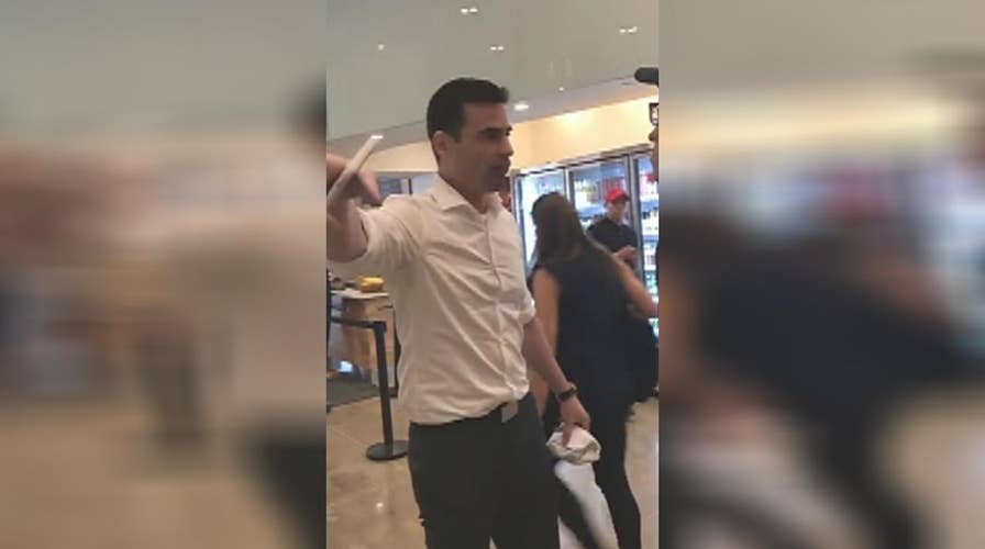 Man berates lunch-counter workers for speaking Spanish