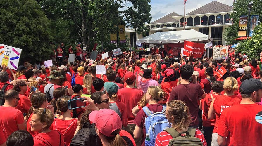 North Carolina's capital flooded by sea of teachers in red