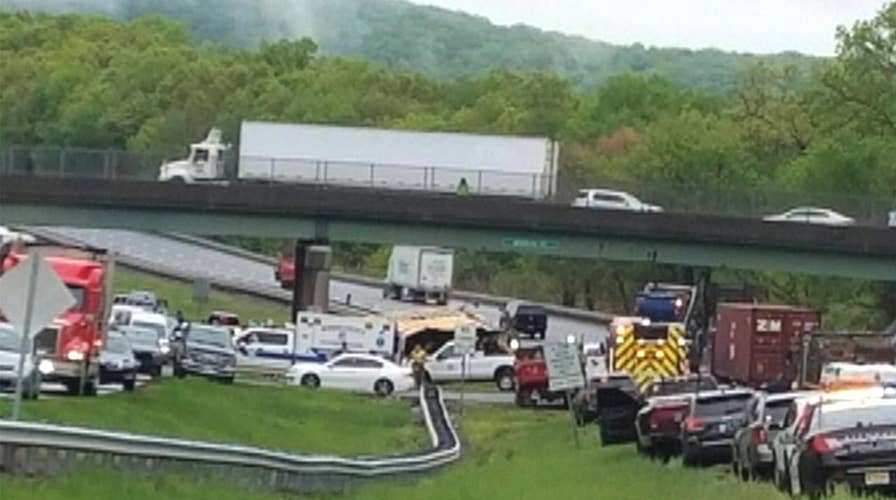 New Jersey school bus collides with dump truck