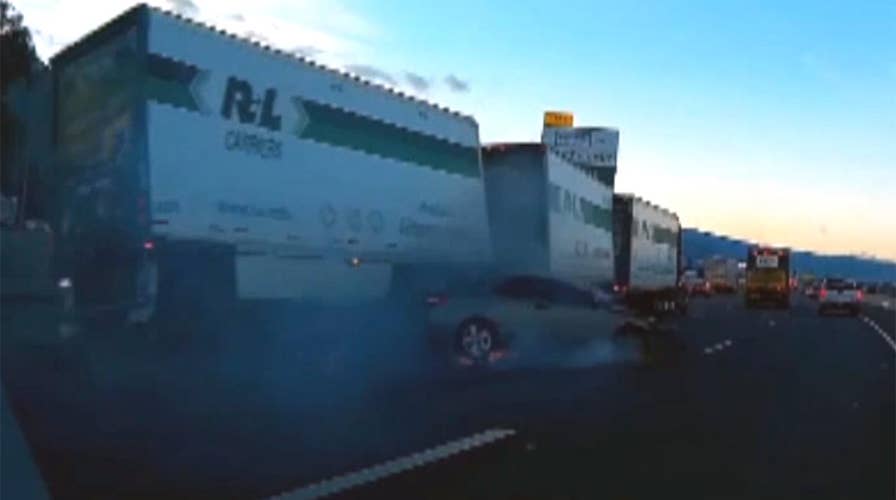 Suspects trying to flee police collide with truck