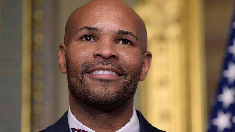 Surgeon General Jerome Adams Saves The Day When Airline Passenger 