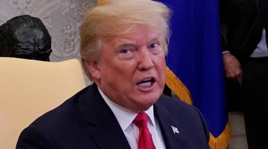 Trump defends remark calling MS-13 gang 'animals'