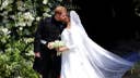 Meghan Markle 'looked absolutely beautiful' in gown, Princess Diana's dress designer reportedly says