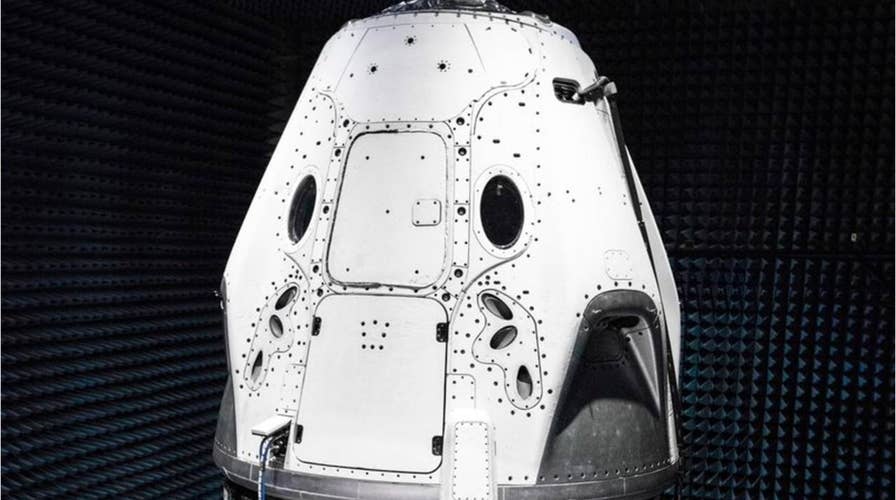 Elon Musk unveils new SpaceX Dragon