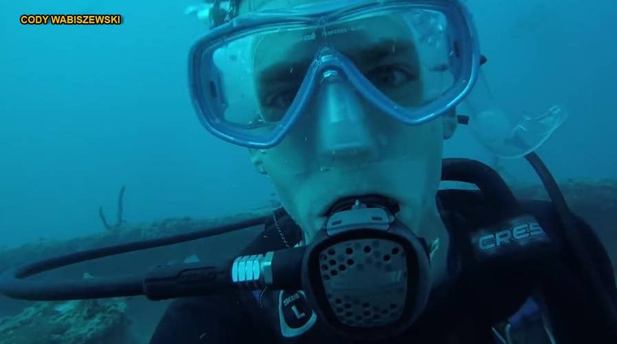 15-foot great white shark shocks Florida scuba divers