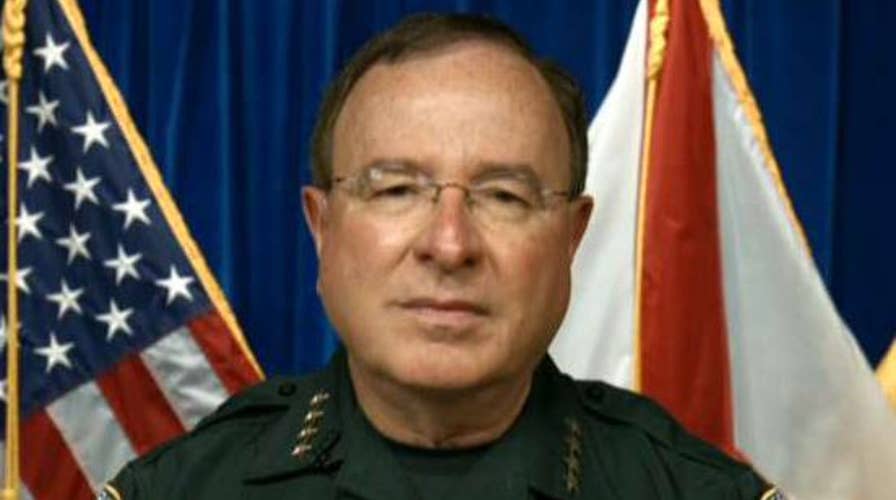 Florida sheriff orders armed officers to schools
