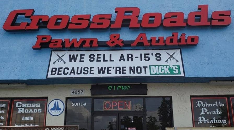 Pawn shop trolls Dick’s Sporting Goods with sign