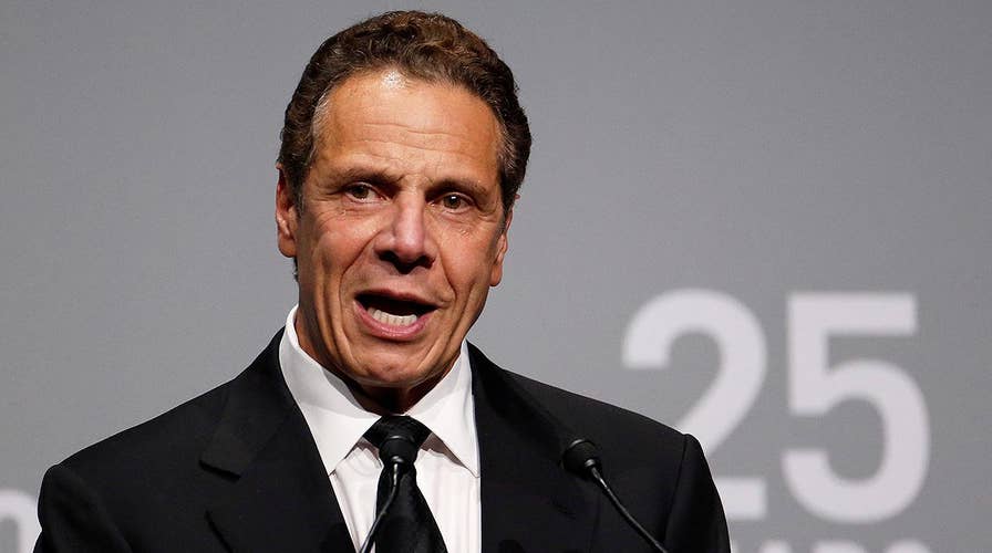 New York governor issues pardons to let parolees vote