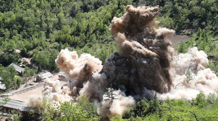 Reporters view purported demolition of North Korea test site