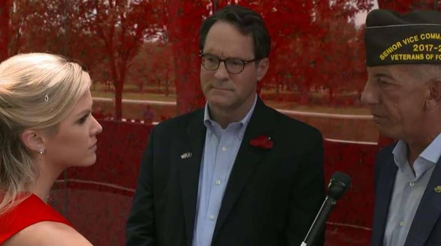 Wall of poppies displayed in honor of fallen service members