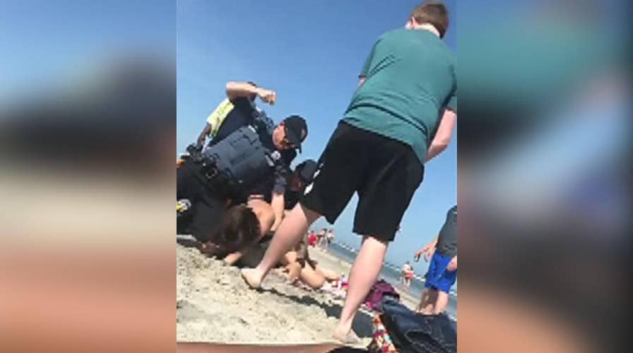 New Jersey officers fight woman at Wildwood beach