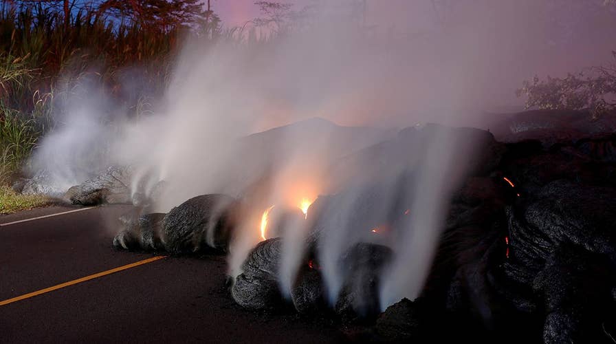 New lava flow covers crucial highway in Hawaii