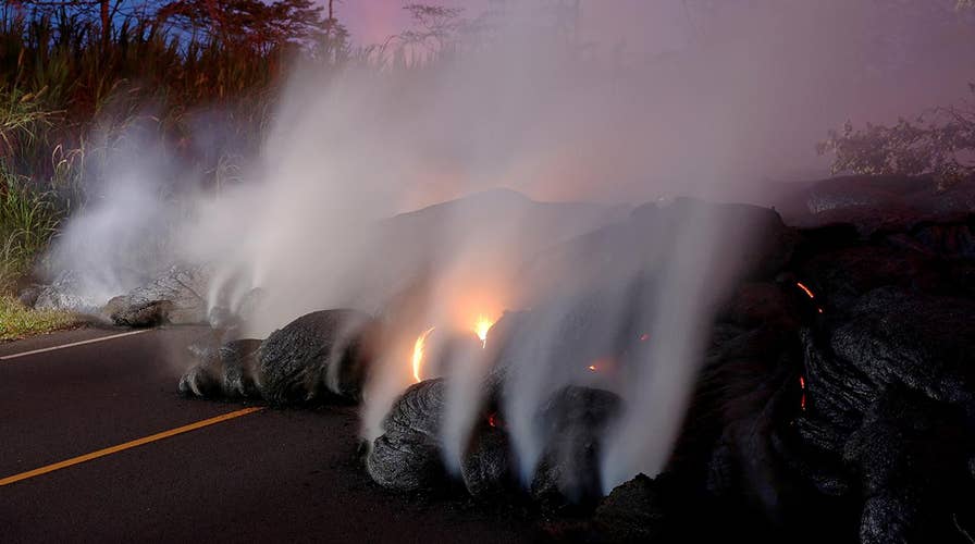 New lava flow covers crucial highway in Hawaii