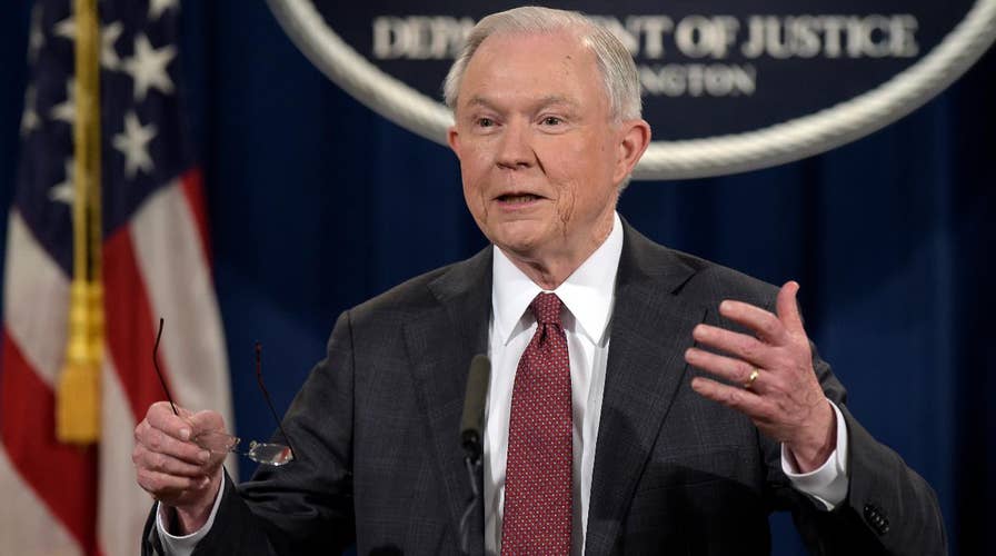 Despite pressure, no sign Jeff Sessions plans to resign