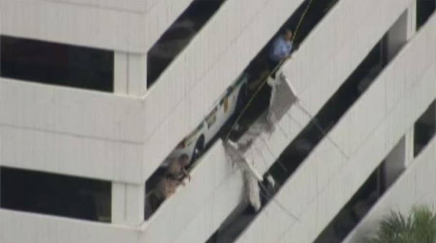 American Airlines van plunges off 4th-floor garage