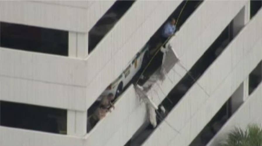 American Airlines van plunges off 4th-floor garage 