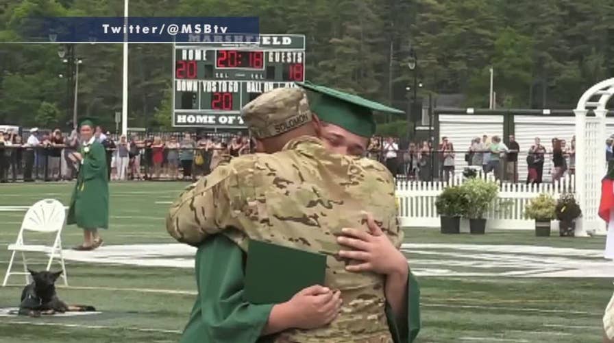 Military father surprises son at high school graduation