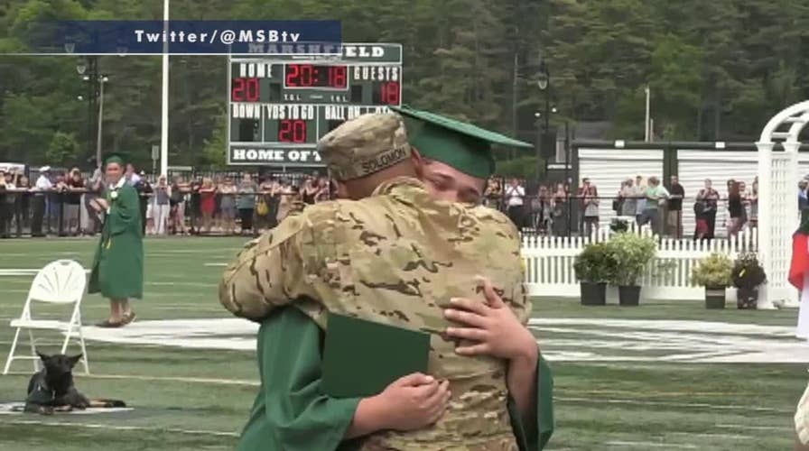 Military father surprises son at high school graduation