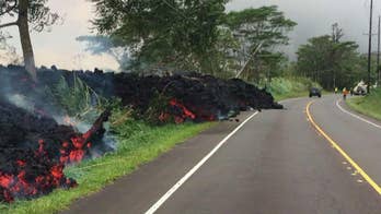 Kilauea lava destroys hundreds of homes as explosion spews toxic ash a mile high