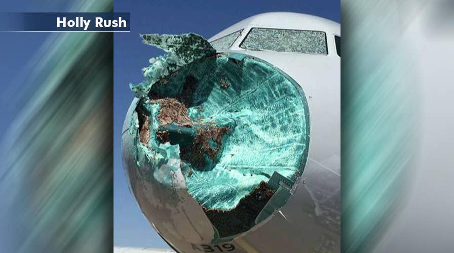 Dramatic new pictures of plane damaged in hail storm