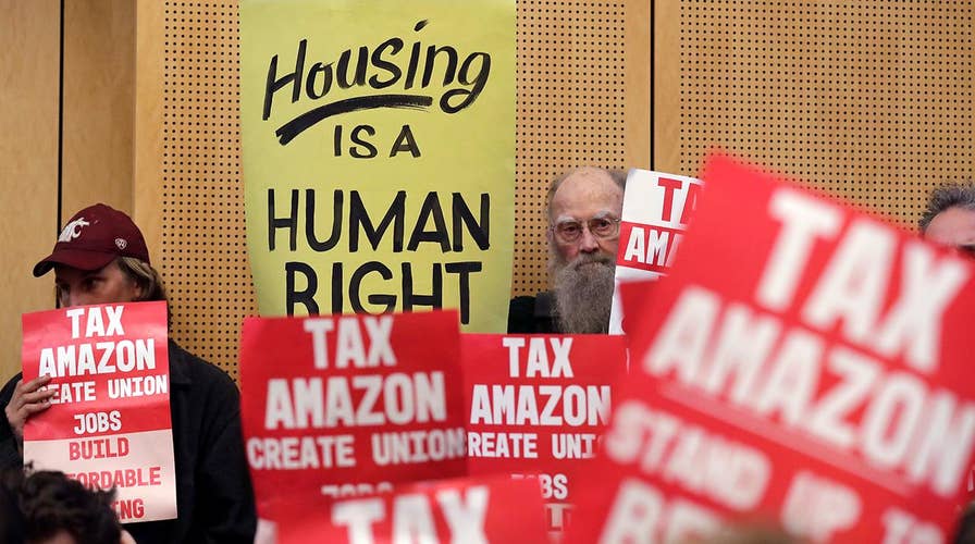 Seattle backs off new tax on big businesses