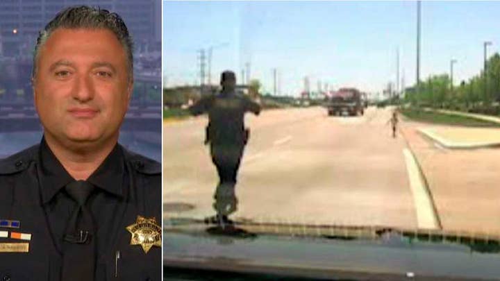 Hero cop saves toddler wandering into traffic