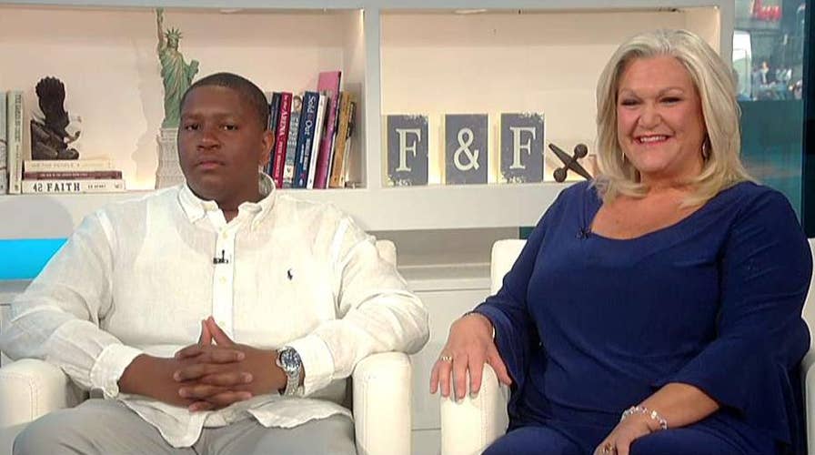 Teen adopted after pleading for family graduates high school