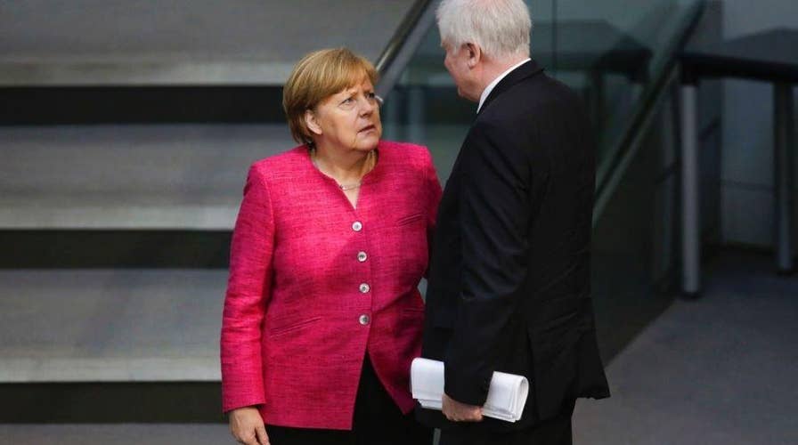 Angela Merkel at odds with coalition partners over migrants