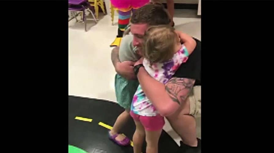 Little girls get surprise of lifetime when Army dad returns home