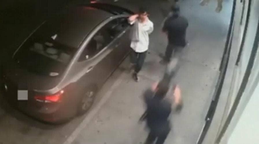 Warning, graphic video: Officer shoots fleeing suspect