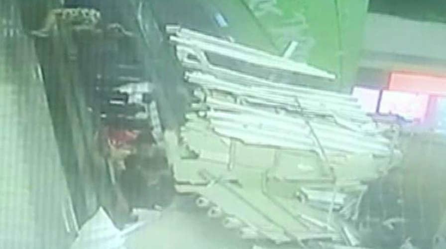 Roof collapses on top of packed escalator in China