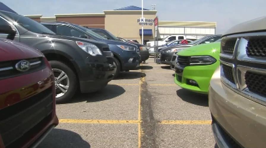 Mother arrested after leaving three children in hot car