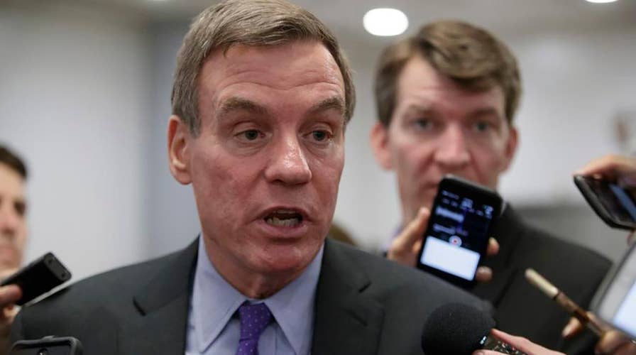 Report: Sen. Warner jokes about revealing Russia probe info