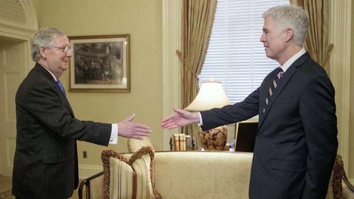 Mitch McConnell trolls with photo of Gorsuch