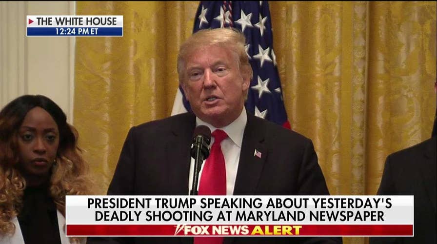Trump expresses regret over "horrific" attack on Maryland newspaper.