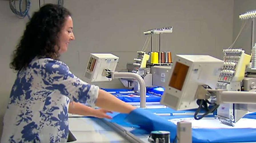 Behind the scenes of one of the nation's largest flag makers