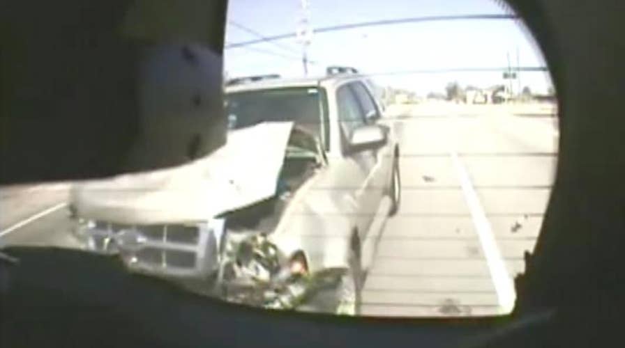 Distracted driver rams into police car in Georgia