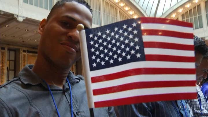 New US citizens take the Oath of Citizenship