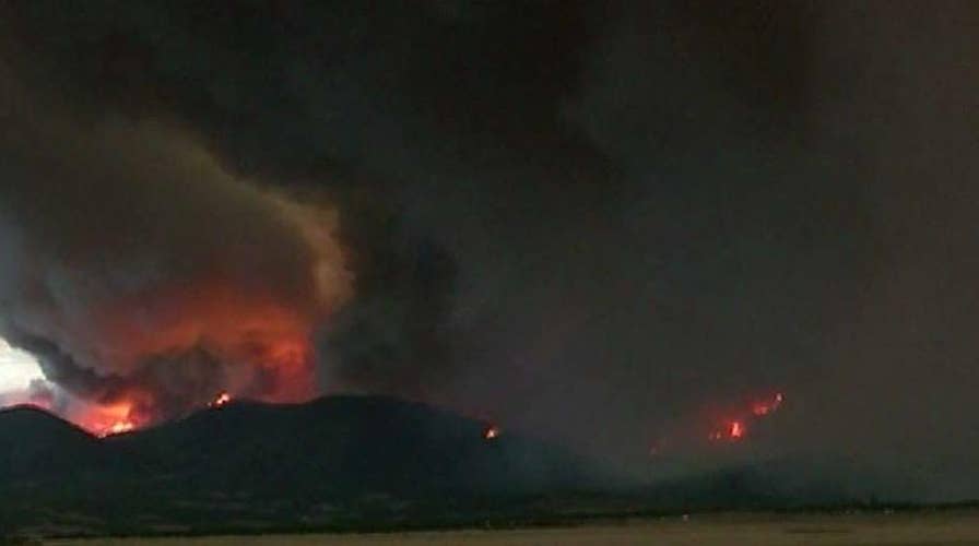 Dozens of wildfires raging in western states