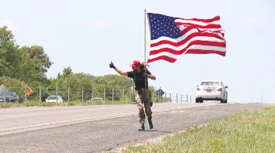 Military veteran goes on patriotic run with American flag