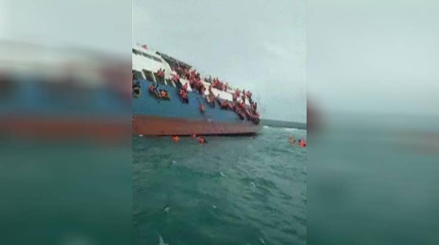 Crews rescue passengers from sinking ferry off Indonesia